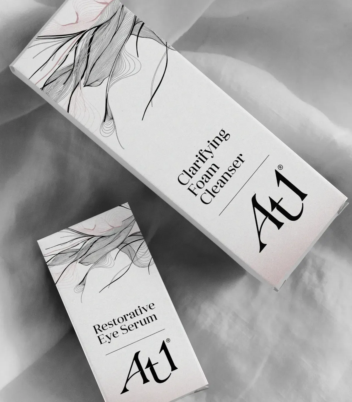 Box shots of two items showing a thin webbed pattern on a grey background